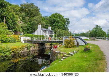 Beauty Of Crinan Canal - Scenic Water Way With Gates And Bridges. Summer In Scotland.