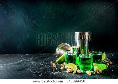 Three Shot Glasses With Absinthe