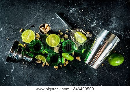 Three Shot Glasses With Absinthe
