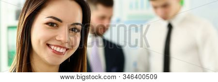 Portrait Of Attractive Lady Wearing Classy Bluse And Looking At Camera With Joy. Gorgeous Colleague 