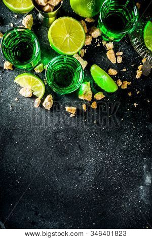 Three Shot Glasses With Absinthe