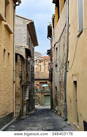 Medieval Narrow Street In Small  Old Village Of Mazan Shown At Dawn, Provence, France