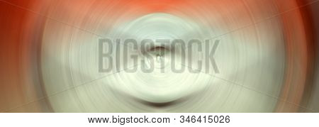 Abstract Background Of Colorful Spin Circle Radial Motion Blur.