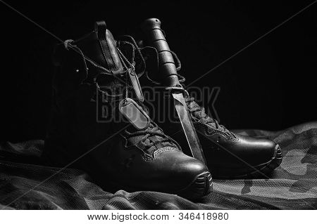 Military Boots. The Concept Of War, Veterans, Fallen Fighters. Sale Of Military Shoes.