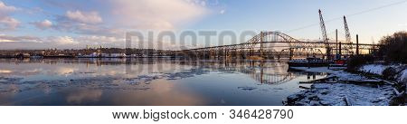 Beautiful Panoramic View Of Fraser River And Pattullo Bridge In The City During A Cold And Icy Winte