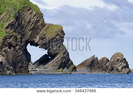 Natural Rock Arch At Beacon Point, Hele Bay Near Ilfracombe, North Devon Coast, Uk