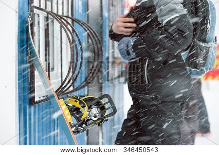 People Is Buying A Ski Pass To The Lift In The Cashbox Of Ski Resort.