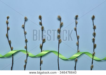 The Verve Sprigs Are Laid Vertically At The Bottom And Decorated With Green Satin Ribbon.