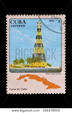 Novosibirsk, Russia - January 07, 2020: Stamp  Faro Collection Printed In  Cuba  Shows Tall Black An