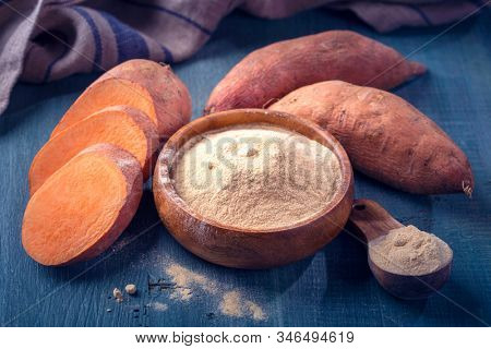 Sweet potato flour in a wooden bowl