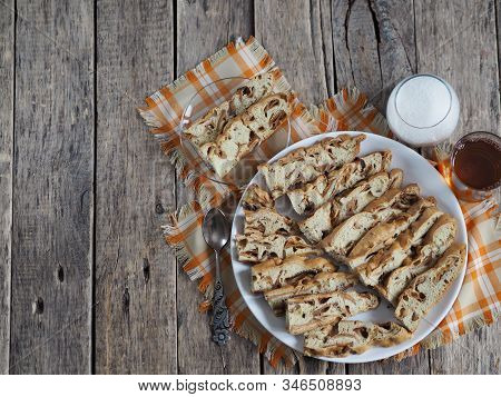 Traditional Apple Pie, Cupcake With Dried Apples, Closeup Presented On A Wooden Table. Home Cooking.