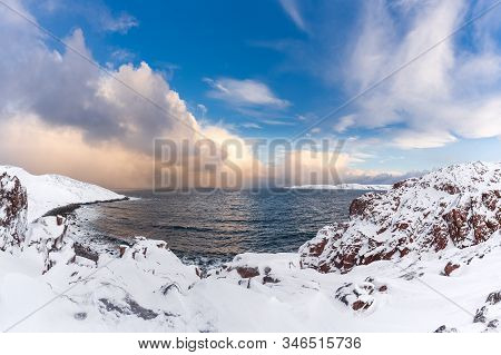 Winter Panorama Of Barents Sea Gulf Surrounded By Snow Covered Rocky Shores In The Far North Above T