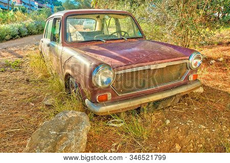Nafplio, Peloponnese, Greece - August 29, 2015: Rusty Wreck Of Car Austin 1300 Mkiii. Made By The Hi
