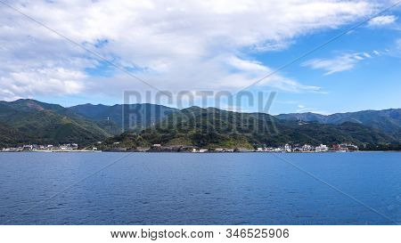 Landscape View Of Mountain Over Blue Sky And White Cloud From The Ferry Boat In The Ocean At Suruga 