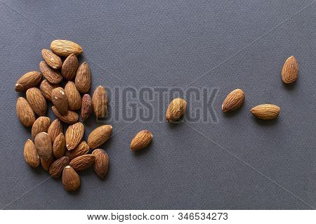 Almonds On Black Background, Healthy Food Concept