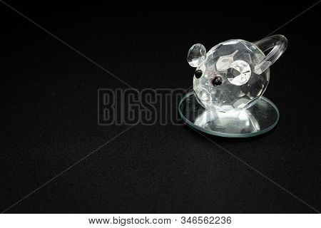 Closeup Of A Figurine Of A Mouse Made Of Glass