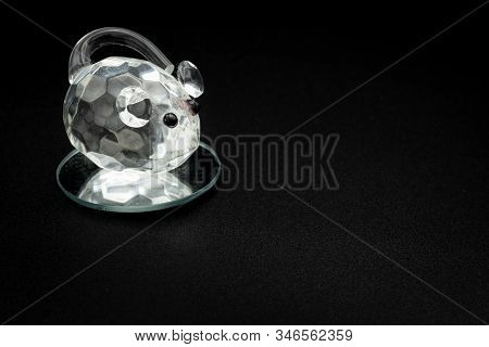 Closeup Of A Figurine Of A Mouse Made Of Glass
