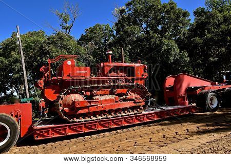 Rollag, Minnesota, September 2 ,2018: The Old International  Td-182 Bulldozer On A Flat Be Trailer I