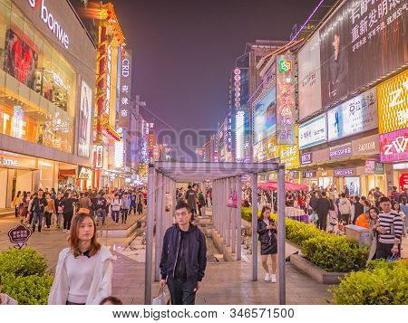 Changsha/china-17 October 2018:unacquainted People Walking On Huangxing Walking Street In Changsha C