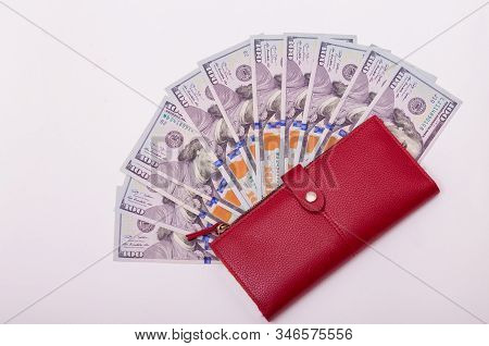 Us Hundred Dollar Curency, Banknotes In Red Wallet. Wealth, Rich, Saving Money, Abundunce. Space For