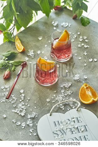Delicious Negroni Cocktails With Campari, Gin, Vermouth And Slices Of Citrus Orange And Ice.
