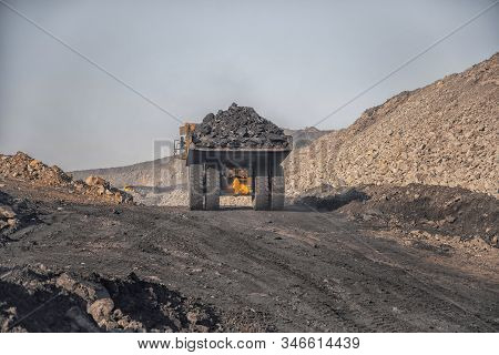 Big Yellow Mining Truck Laden Anthracite Moves Open Pit Coal Mine