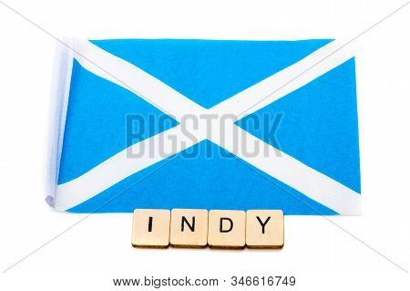 The National Flag Of Scotland, The Saltaire Or Cross Of St Andrews On A White Background With A Sign