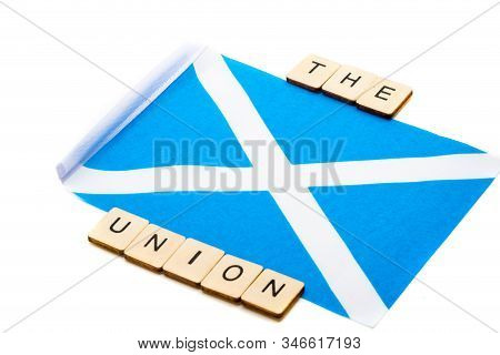 The National Flag Of Scotland, The Saltaire Or Cross Of St Andrews On A White Background With A Sign