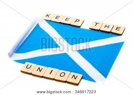 The National Flag Of Scotland, The Saltaire Or Cross Of St Andrews On A White Background With A Sign