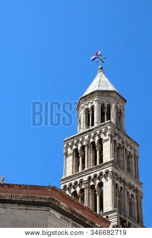 12th Century Bell Tower Of Cathedral Of Saint Domnius, With The National Flag Of Croatia Flying High