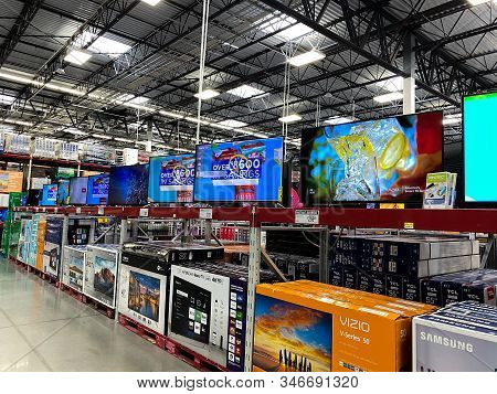 Orlando,fl/usa -1/23/20:  The Tv Aisle Of A Sams Club Wholesale Retail Store With A Variety Of Telev