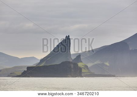 Faroe Islands Sunset Dramatic Coastline Landscape In Vagar Island. Seascape