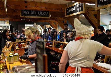 Zaanse Schans, Holland, August 2019. Tasting Of Typical Dutch Cheeses: Along The Counter There Are S