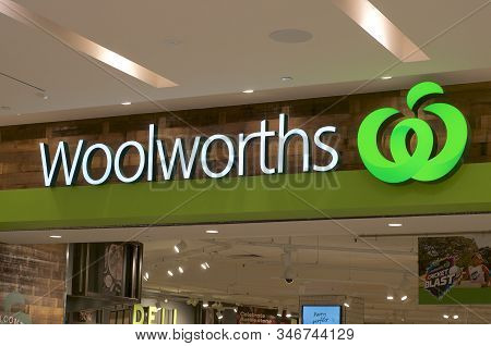 Brisbane, Queensland, Australia - 21st January 2020 : Illuminated Woolworths Sign Hanging In Front O