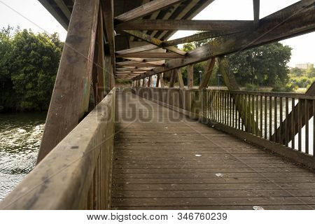 Wooden Bridge In A Village In Northern Spain