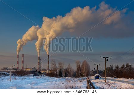 Russia. South Of Western Siberia, Kuzbass. Winter Sunset In The Industrial Zone Of The City Of Myski
