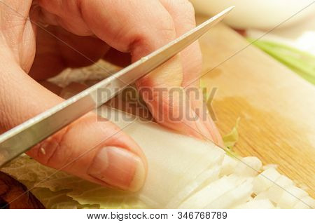 Danger Of Being Cut Heavily When Slicing A Salad