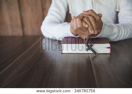 A Woman Sitting And Reading The Bible And Pray For God's Blessing With Faith In His Power The Idea O