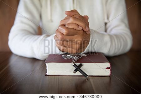 A Woman Sitting And Reading The Bible And Pray For God's Blessing With Faith In His Power The Idea O