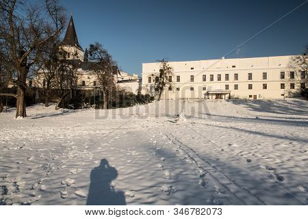 Cheteau Frystat And Kostel Povyseni Sv. Krize Church From Park Bozeny Nemcove Public Park In Karvina