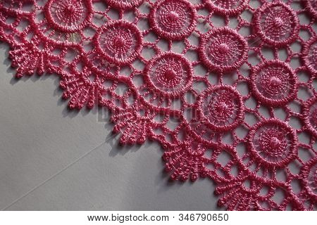 Diagonal Edge Of Bright Pink Crochet Lace