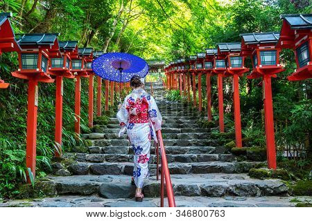 Asian Woman Wearing Japanese Traditional Kimono At  Kifune Shrine In Kyoto, Japan.