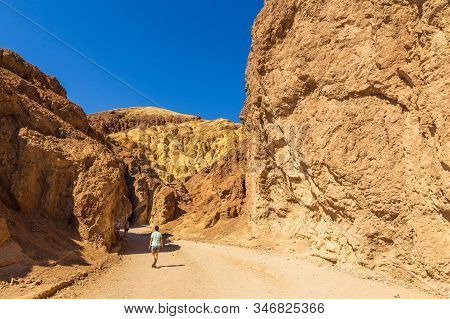 People On The Walk In The Golden Canyon Trailhead. Death Valley National Park, California, Usa.