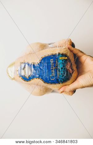 Paris, France - Dec 24, 2019: Vintage Filter Over Man Hand Holding Against White Background Fresh Ca