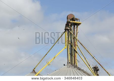 High Part Of An Old Silo And A Partly Cloudy Sky In Rauch, Buenos Aires, Argentina
