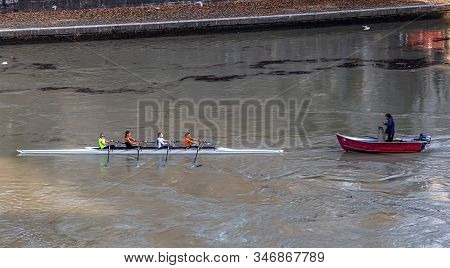 Rome, Italy - December 06, 2019:  Group Of People Training On Kayak. Sightseeing Boat Floating Near 