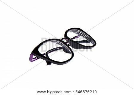 Glasses In A Violet Metallic Frame Isolated On A White Background. Glasses With Plastic Earhooks. Co