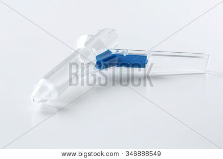 Medical Anoscope Isolated On White. Hemorrhoid Treatment