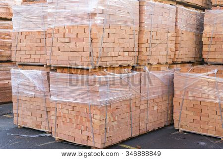 Clay Brick Stored For Building Construction. Industrial Production Of Bricks. Brick Production Line 