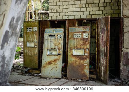Pripyat, Ukraine, May 20, 2019. Rusty Broken Water Dispensing Wending Machines.